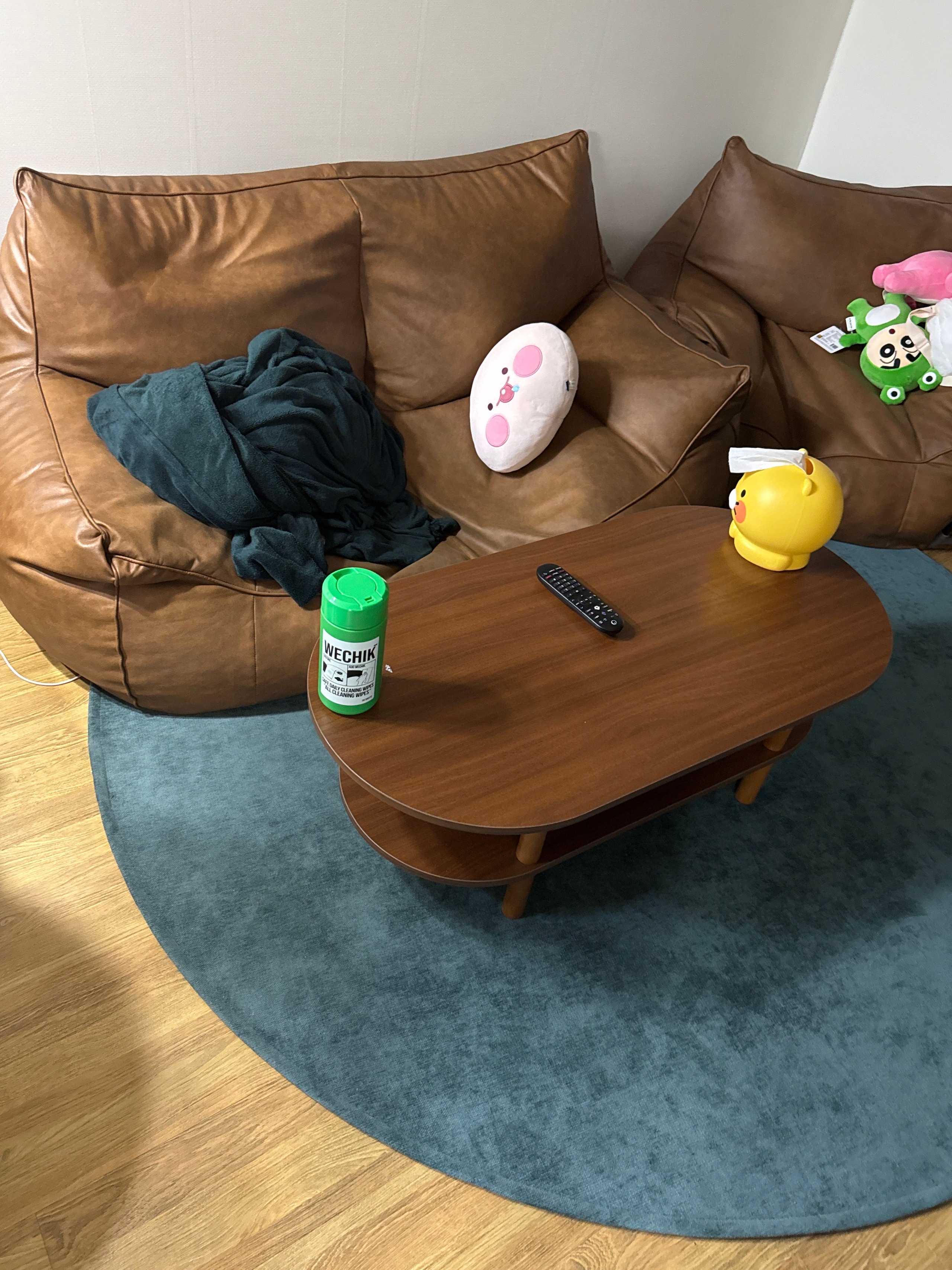 Walnut Oval Coffee Table with Storage Shelf user photo