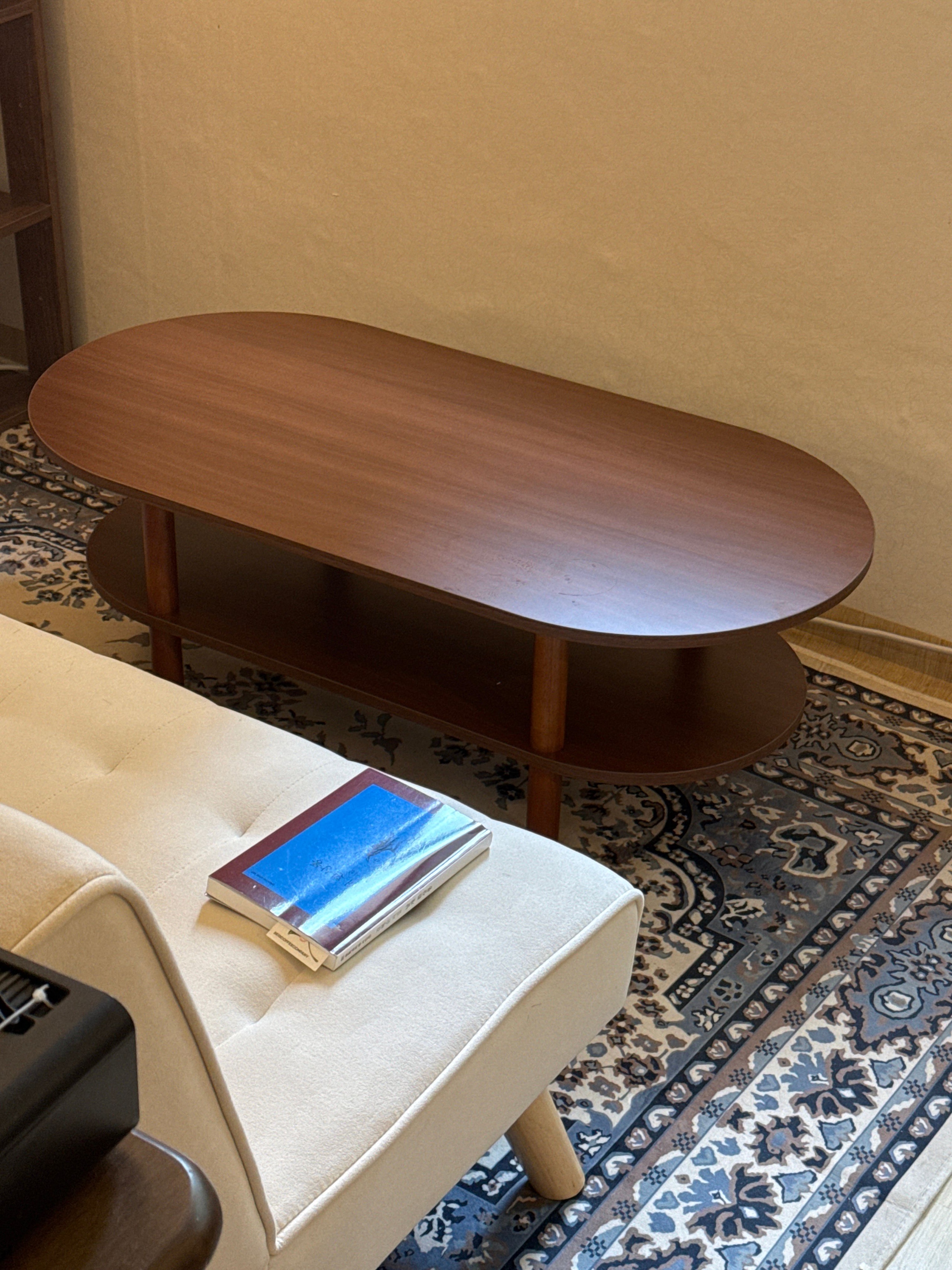 Walnut Oval Coffee Table with Storage Shelf user photo